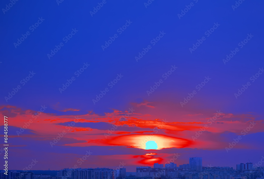 Sunset over the city . Cityscape in twilight