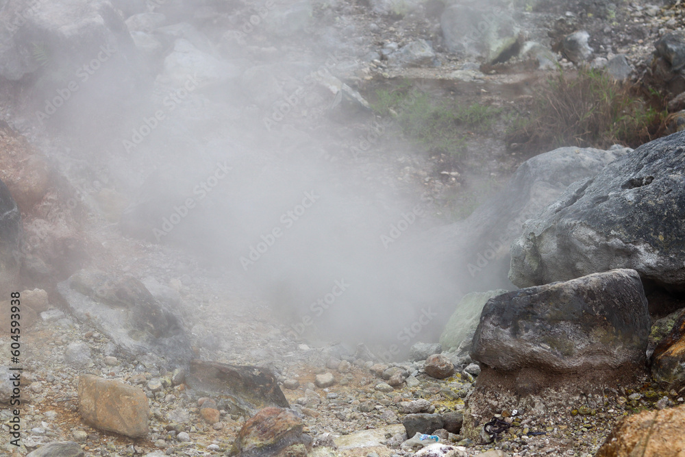 geothermal smoke vapor that comes out of the gaps in the rocks produces sulfur geothermal smoke vapor that comes out of the gaps in the rocks produces sulfur