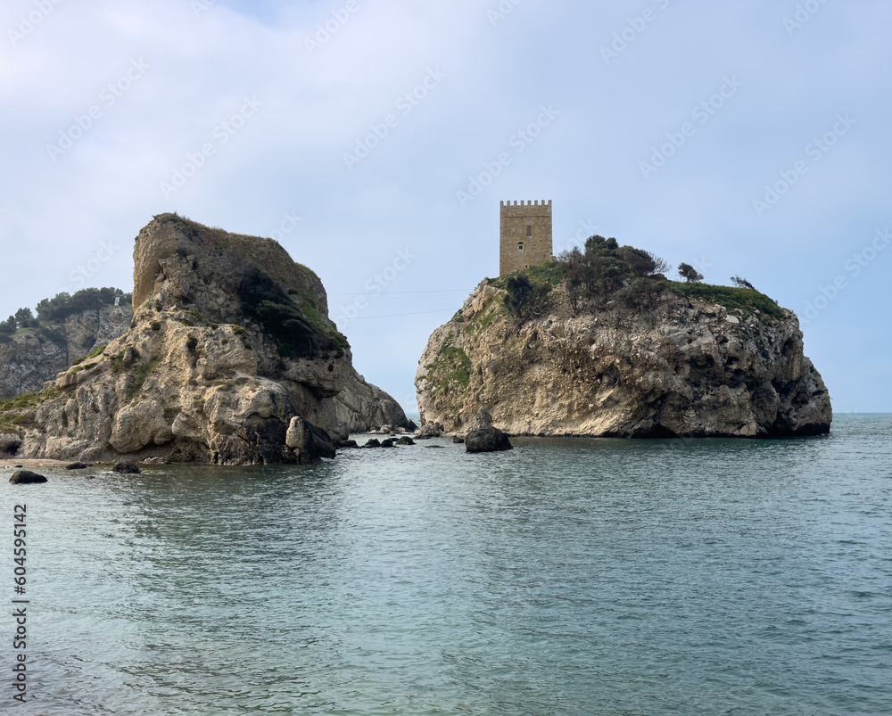 An old castle on a cliff.Beautiful sea and blue sky.