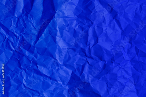 crumpled blue paper background texture close up copy space