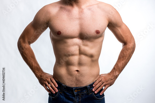 Fit and handsome man with beautiful torso. Strong and handsome ,fit and sporty bodybuilder man. Man Fitness Model Torso showing six pack abs