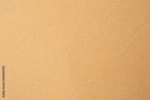Texture of beige paper sheet as background, closeup © New Africa