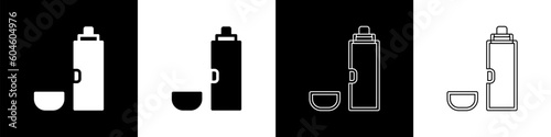 Set Thermos container icon isolated on black and white background. Thermo flask icon. Camping and hiking equipment. Vector