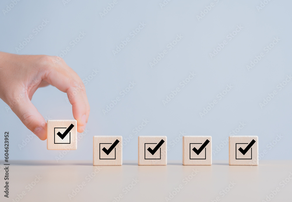 Task Checklist, List survey, and assessment form online. Hand holding a ...