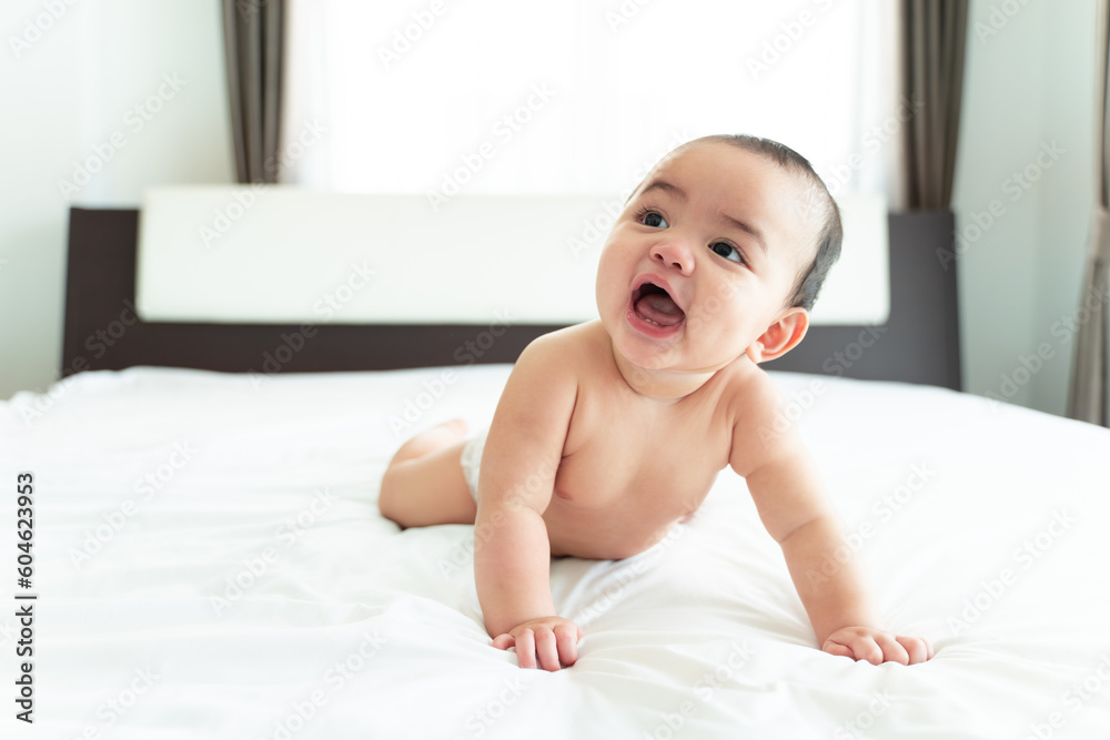 Baby smile, Little Boy lying on the bed, small child wandering. Baby smile, Little Boy lying on the bed, small child wandering.