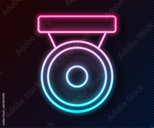 Glowing neon line Boxing gong icon isolated on black background. Boxing bell. Vector