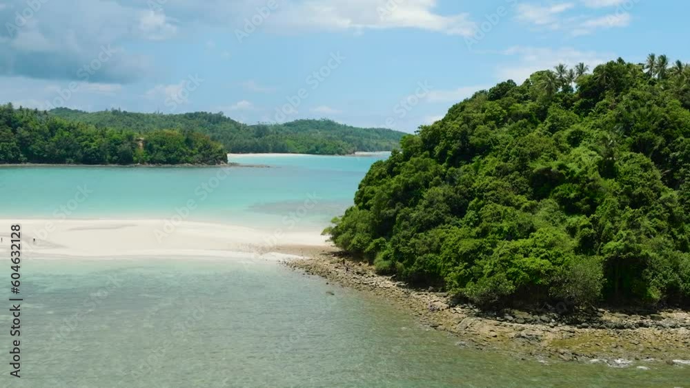 Tropical landscape with sandy beach and island. Kelambu Beach. Borneo, Malaysia. Tropical landscape with sandy beach and island. Kelambu Beach. Borneo, Malaysia.