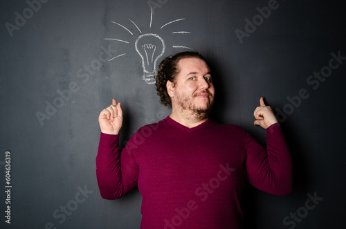 Business and work. Funny fat man posing in the studio.