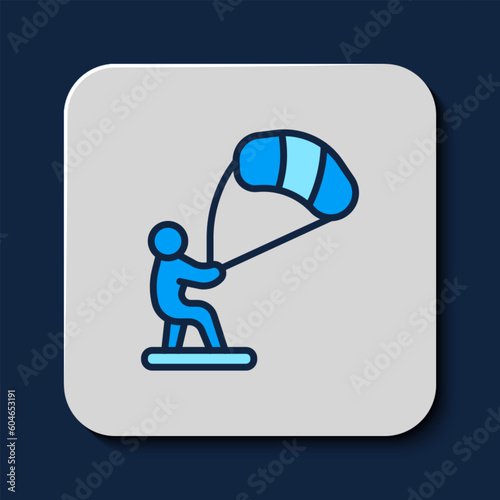 Filled outline Kitesurfing icon isolated on blue background. Vector