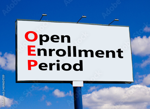 OEP symbol. Concept words OEP Open enrollment period on beautiful big billboard. Beautiful blue sky cloud background. Medical and OEP Open enrollment period concept. Copy space. photo