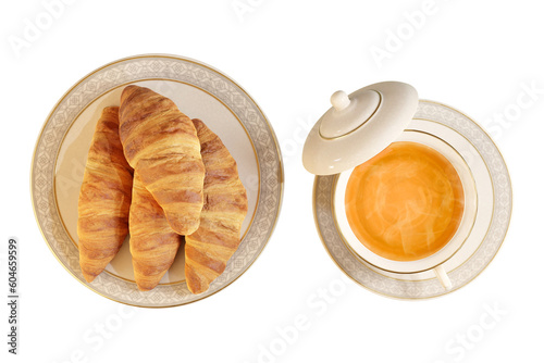 clipping paths,top view croissants on plate isolated on white background with hot tea drink,bread ready for breakfast.