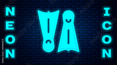 Glowing neon Rubber flippers for swimming icon isolated on brick wall background. Diving equipment. Extreme sport. Diving underwater equipment. Vector