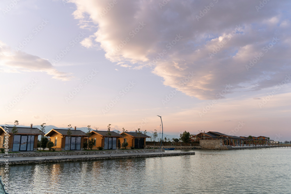 Patoku Lagoon resorts , Albania, calm sea under a beautiful sky, sunrise