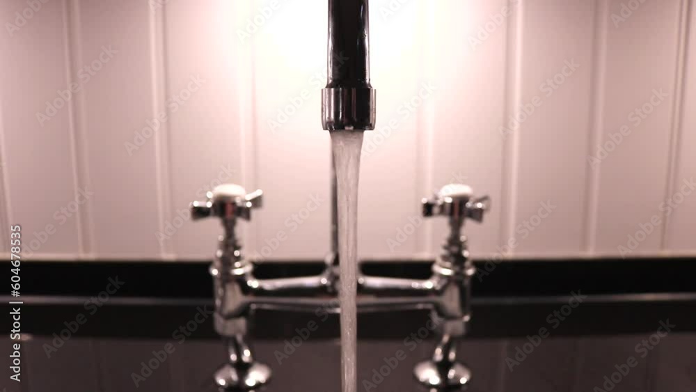 Modern Kitchen Tap Faucet Running Close Up Modern Kitchen Tap Faucet Running Close Up