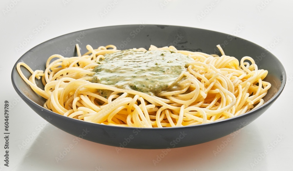  Delicious plate of italian spaghetti pasta with sauce over isolated white background
