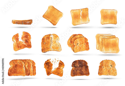 Big set of different toasted bread slices from toaster isolated on white background. Diet food or light breakfast concept, golden bread slices for design or project.