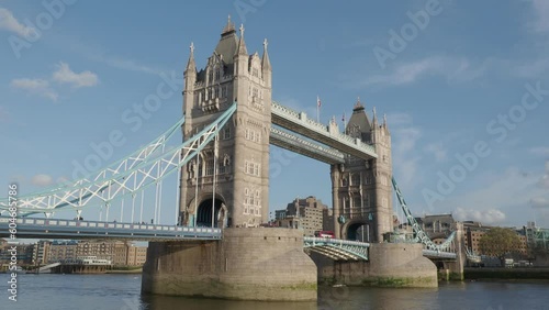 Tower Bridge and Thames River United Kingdom static camera footage. UK Iconic Tower Bridge Summer evening. Tripod Shot of London landmark Towerbridge England which beautiful and full of historical photo