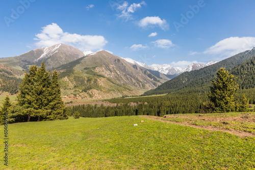 Mountain summer landscape of Jeti-Oguz (seven bulls) gorge near Issyk-Kul lake, Kyrgyzstan. Trekking to The Maiden's Tears Waterfall