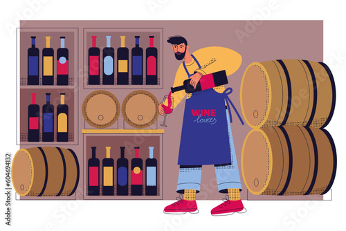 Winemaker with wine glass and bottle. Wine cellar. Restaurant worker