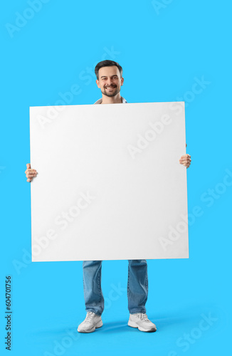 Handsome man with big blank...