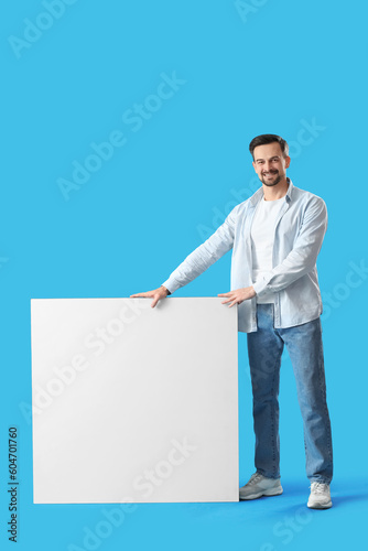 Handsome man with big blank...