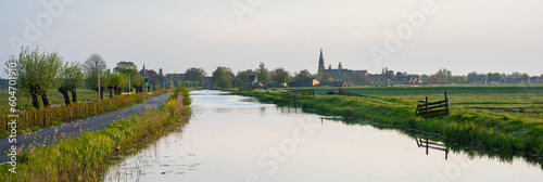 Panorama of the Dutch water-rich low-lying landscape in the vicinity of the village of Reeuwijk-Dorp, The Netherlands.