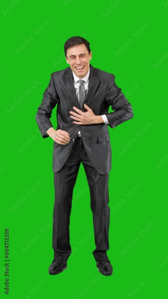 Amazed man celebrating success in studio. Chroma key Amazed man celebrating success in studio. Chroma key