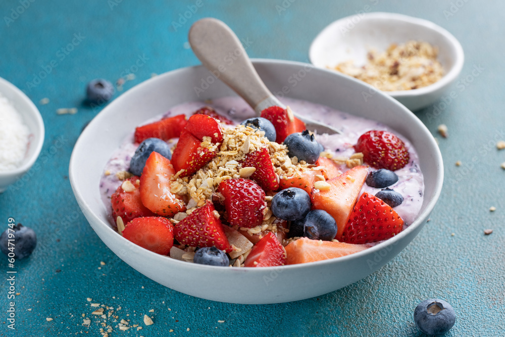 Muesli with fruits served in bowl Muesli with fruits served in bowl