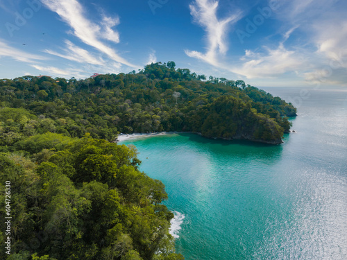 Aerial view of Manuel Antonio National Park in Costa Rica. The best Tourist Attraction and Nature Reserve with lots of Wildlife, Tropical Plants and paradisiacal Beaches on the Pacific Coast.