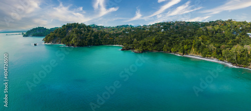Aerial view of Manuel Antonio National Park in Costa Rica. The best Tourist Attraction and Nature Reserve with lots of Wildlife  Tropical Plants and paradisiacal Beaches on the Pacific Coast.