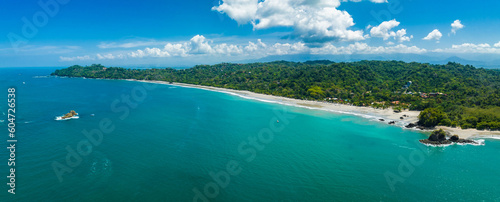 Fototapeta Naklejka Na Ścianę i Meble -  Aerial view of Manuel Antonio National Park in Costa Rica. The best Tourist Attraction and Nature Reserve with lots of Wildlife, Tropical Plants and paradisiacal Beaches on the Pacific Coast.