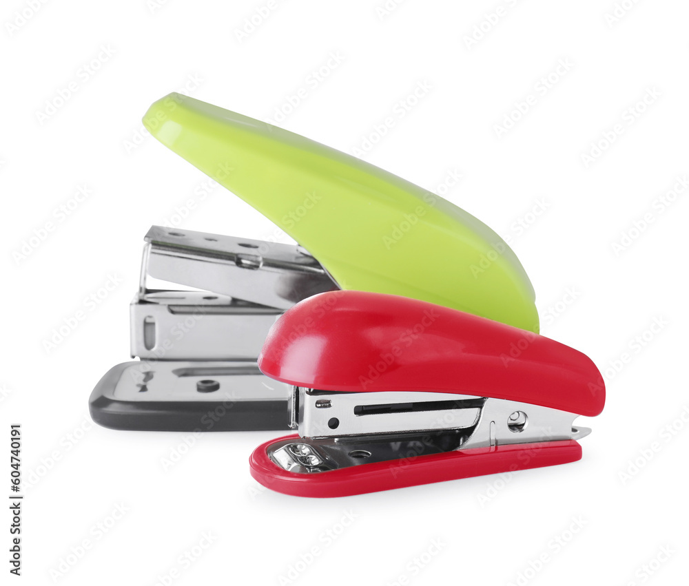 New bright color staplers isolated on white New bright color staplers isolated on white