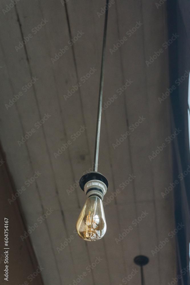 light bulbs on wooden beams in a ceiling light bulbs on wooden beams in a ceiling