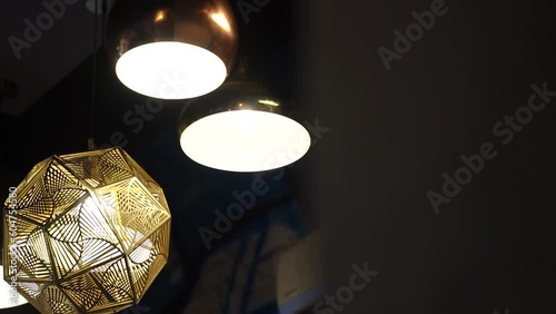 Slow-motion parallax technique captures the modern dinner table and sleek seating arrangements inside a stylish hipster eatery.