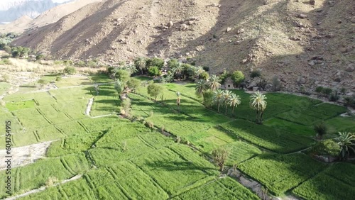 Aerial Flying Over Remote Road Through Mountainous Valleys In Khuzdar. Dolly Forward photo