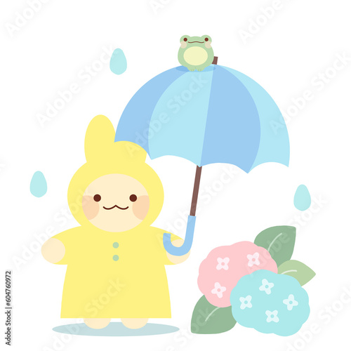 雨の中、傘をさすレインコートを着たウサギ