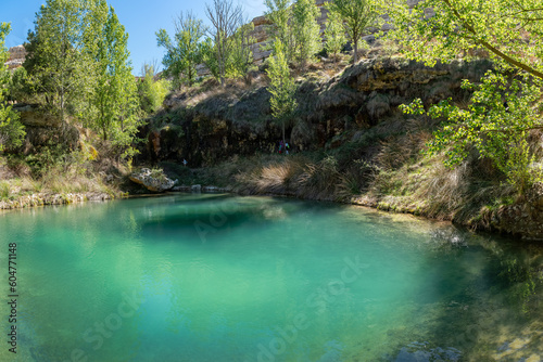 Beautiful lagoon between steep cliffs in the forest called Aguallueve in Anento, Zaragoza.