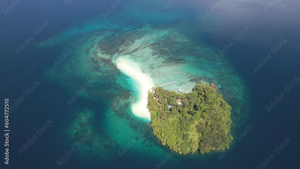 A full view of the beautiful matan Island in tropical paradise Raja Ampat Indonesia A full view of the beautiful matan Island in tropical paradise Raja Ampat Indonesia