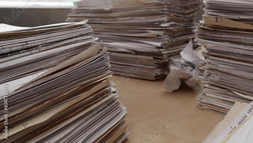 Stack business paper on desk, paperwork in office. Printer and photocopier paper