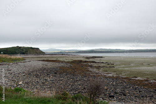 Anglesey beach with rocks and sea at low tide