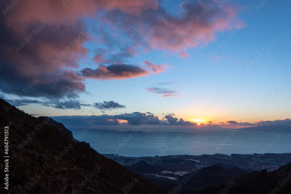 Landscape with Roques de Garcia stone and Teide mountain volcano at sunset in the Teide National Park, Tenerife, Canary Islands, Spain.