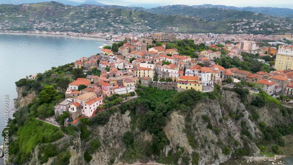 This aerial drone video shows the old city of Agropoli in the province of Salerno, Italy. The beautiful old city center is located on top of the cliffs of the mediterranean coastline. This aerial drone video shows the old city of Agropoli in the province of Salerno, Italy. The beautiful old city center is located on top of the cliffs of the mediterranean coastline.