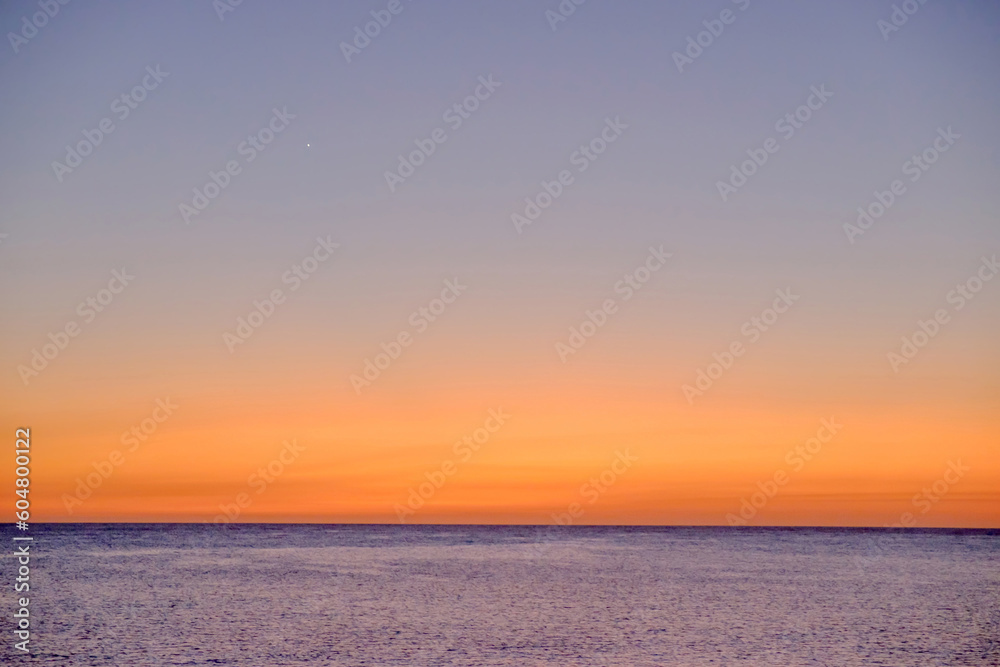 Fototapeta premium Background with sea on the sunset, space for text.