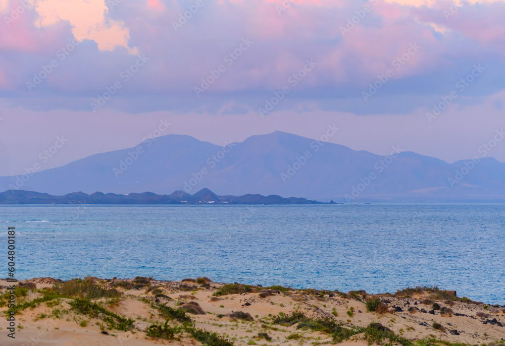 View on Corralejo beach and island Lobos at sunset on the Canary Island Fuerteventura, Spain.