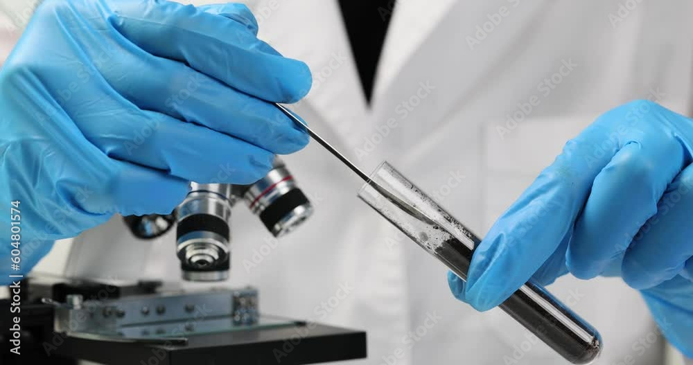 Test tube with soil sample in chemical laboratory closeup. Biochemical analysis of soils concept Test tube with soil sample in chemical laboratory closeup. Biochemical analysis of soils concept