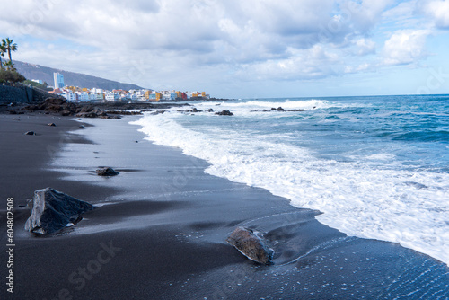 Candelaria black sand beach in Tenerife at Canary Islands