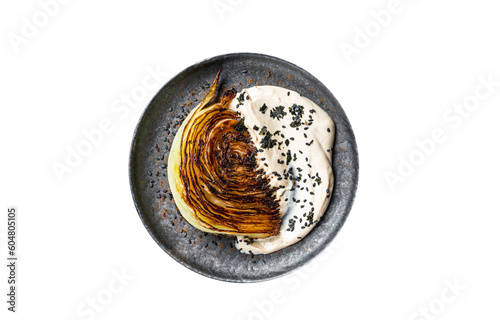 Grilled cabbage steaks with spices on a gray plate, healthy vegan food. Isolated, transparent background.