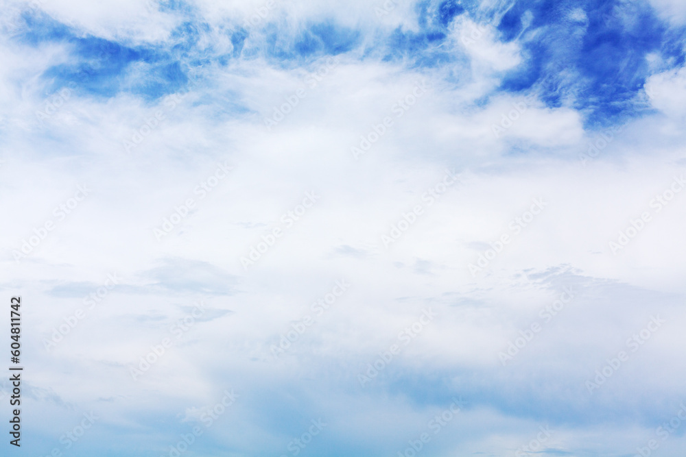 Fototapeta premium White cirrus clouds blue sky background, fluffy cumulus cloud texture closeup, beautiful cloudy skies, cloudscape, summer sunny day heaven, cloudiness weather backdrop, ozone layer, overcast, oxygen