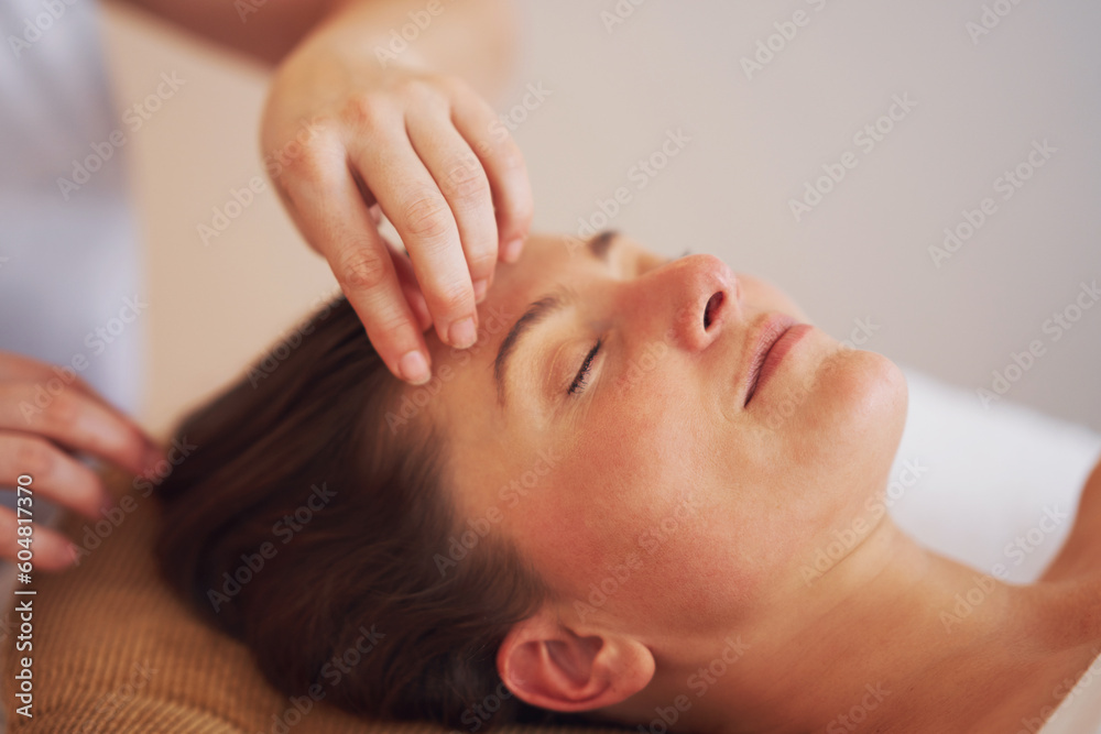 Woman having japan style face massage in salon Woman having japan style face massage in salon