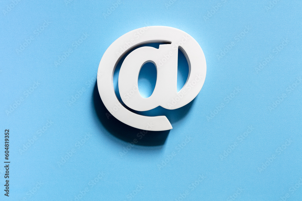 E-mail symbol on blue background concept for internet, contact us and e-mail address - obrazy, fototapety, plakaty 